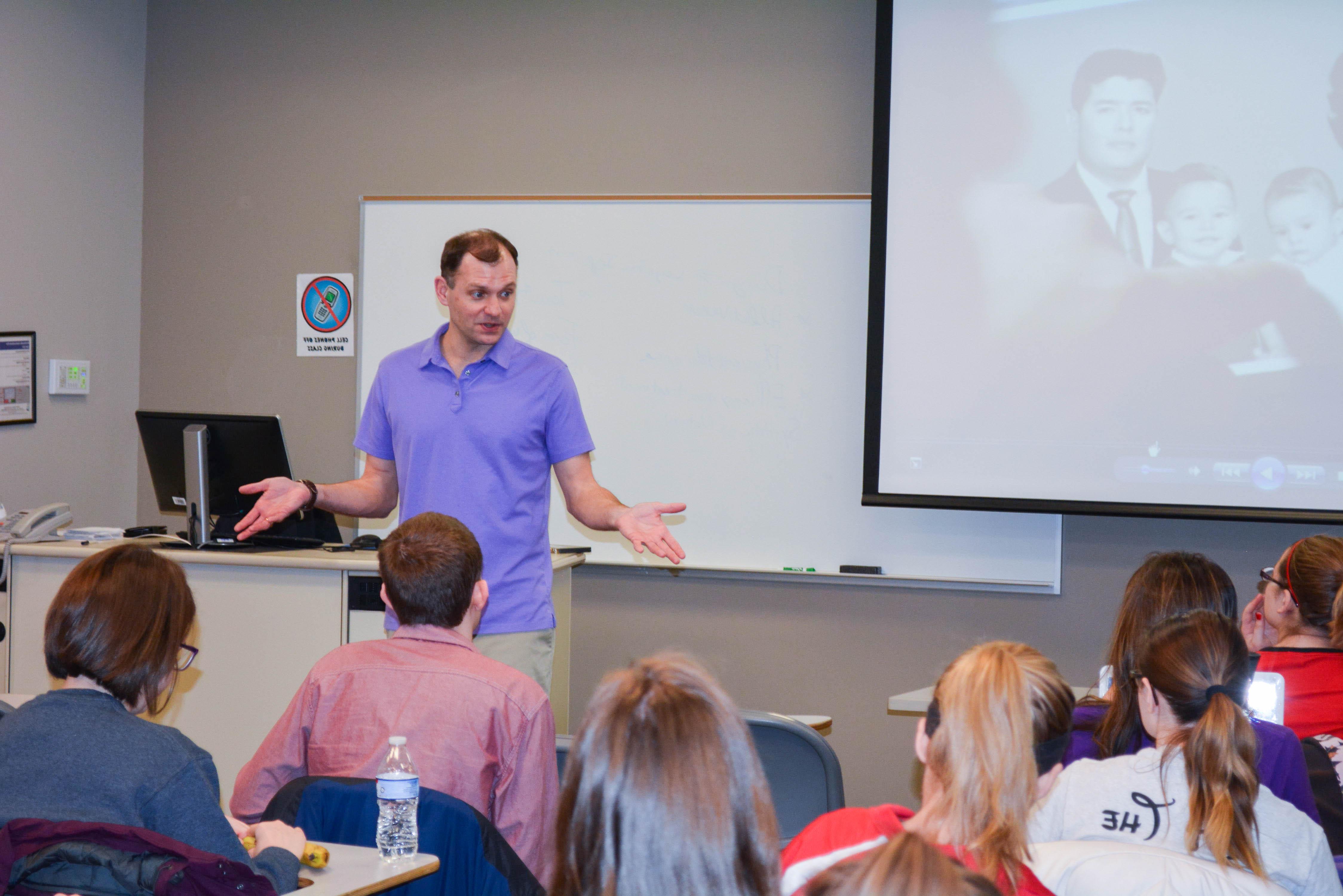 Human development and family science professor and students in a classroom 