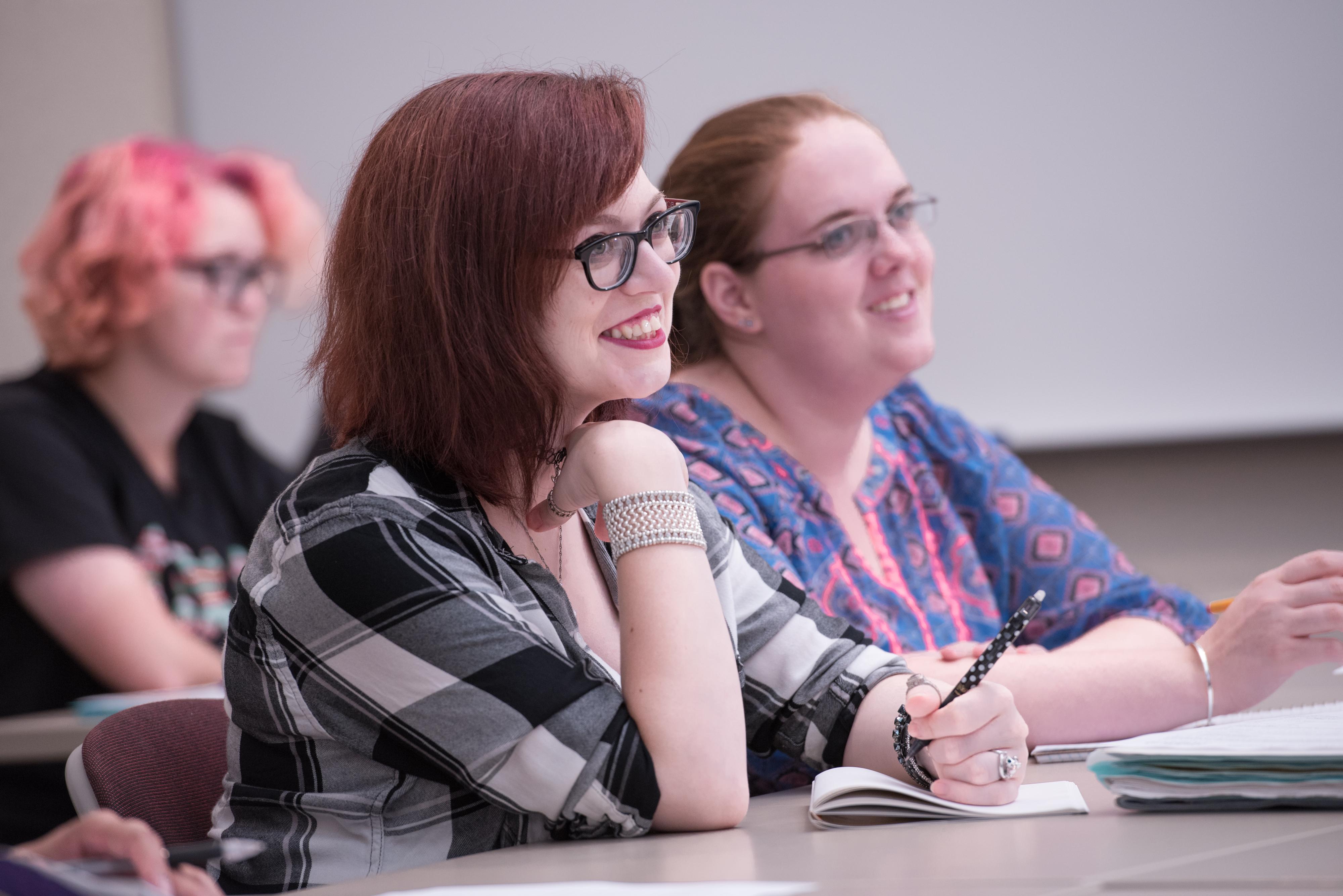 student smiling in class